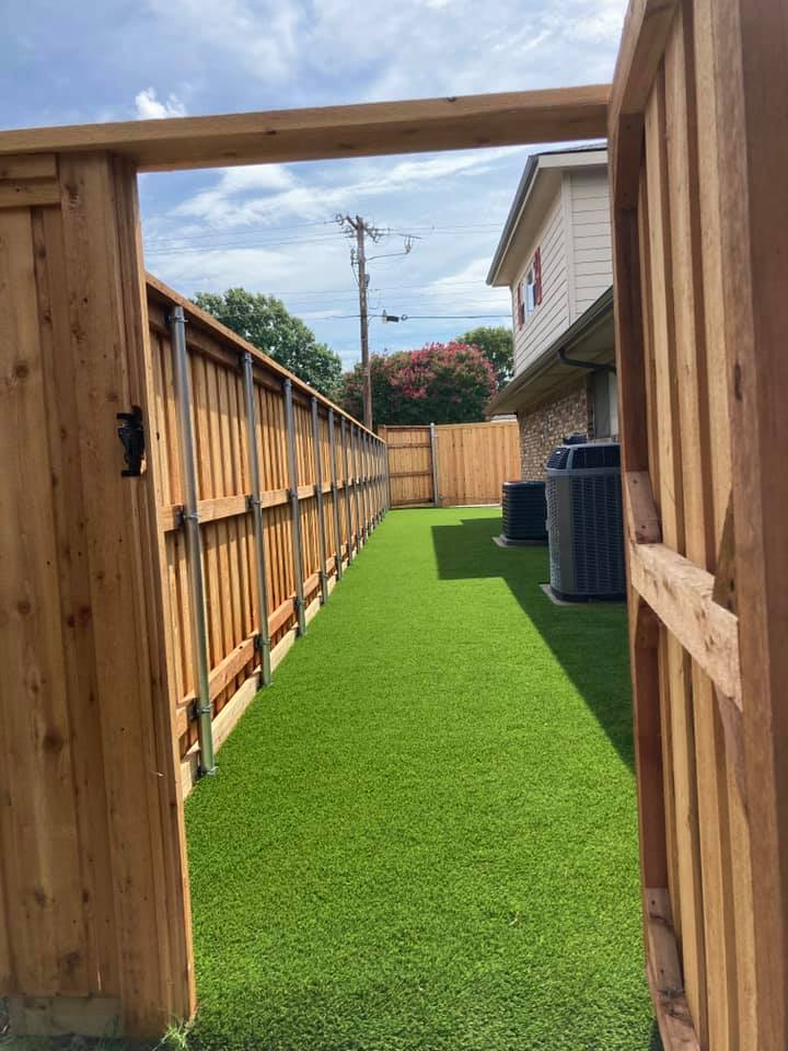 Sideyard in Richardson TX featuring pet turf for dog run