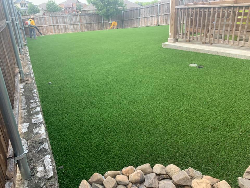 Final Touches on Pet Turf Installation in Richardson, TX