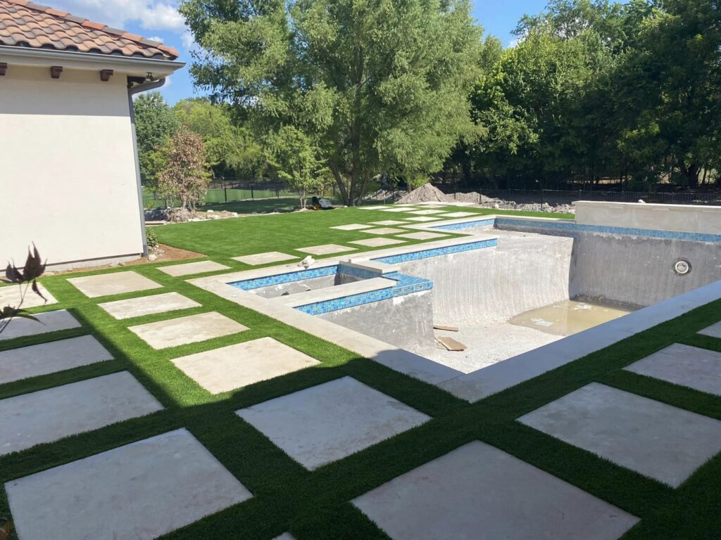Pro Series Artificial Turf and Turf Strips around new swimming pool in McKinney, TX